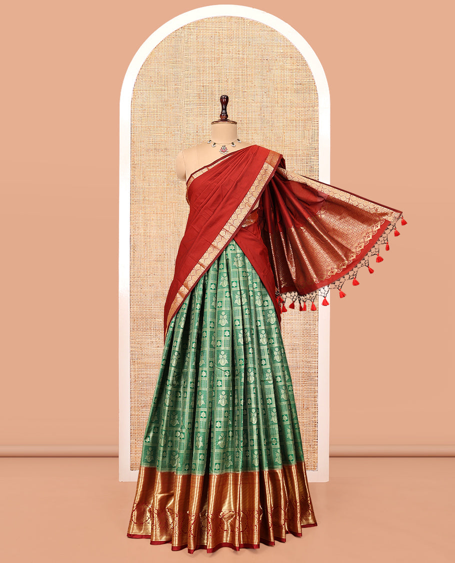 Green Art Silk Material Half Saree Set Featuring a Jacquard Skirt, a Contrast Traditional Zari Design Border, Contrast Blouse, and Zari Designs Dhavani