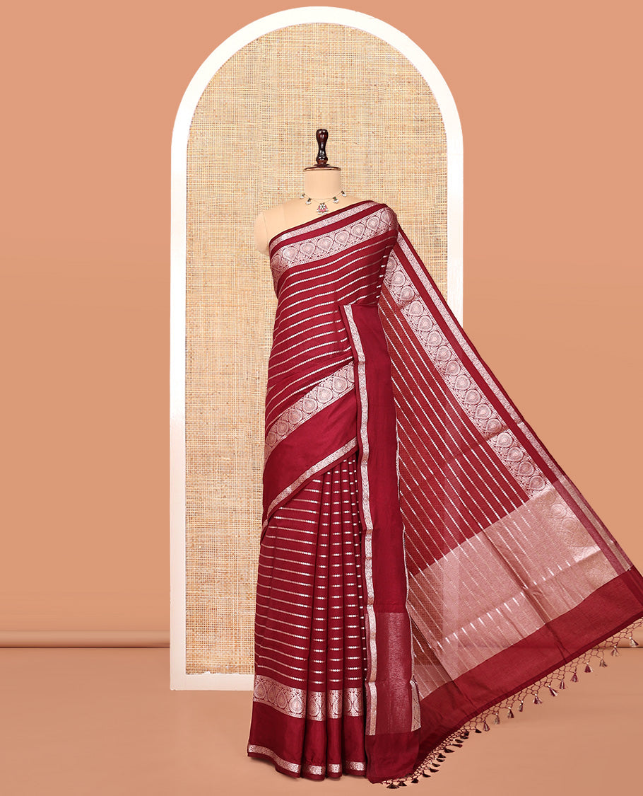 Maroon Assam Silk Saree, Gleamed Up with Zari Stripes, Highlighted by a Traditional Border, a Self-Pallu, and a Matching Blouse