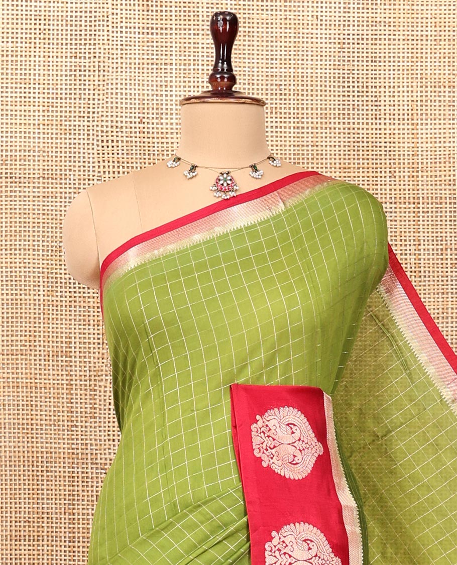 Green Assam Silk Saree, Decked Up with Checks, Complemented by Contrast Peacock Design Border, Zari-Striped Pallu, and a Contrast Blouse