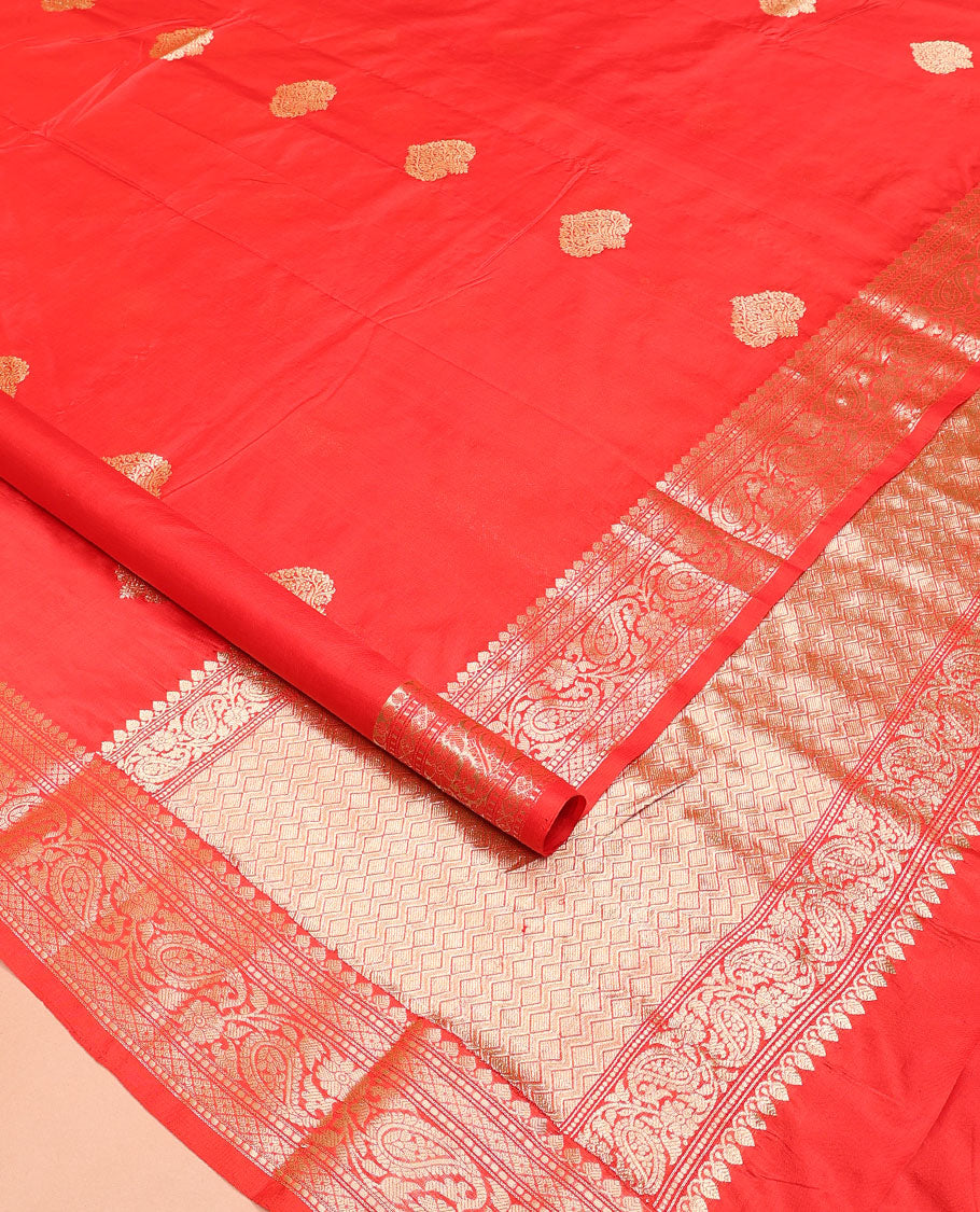 Red zari buttas kathan silk saree, traditional border of paisley creeper designs, and jaal pallu