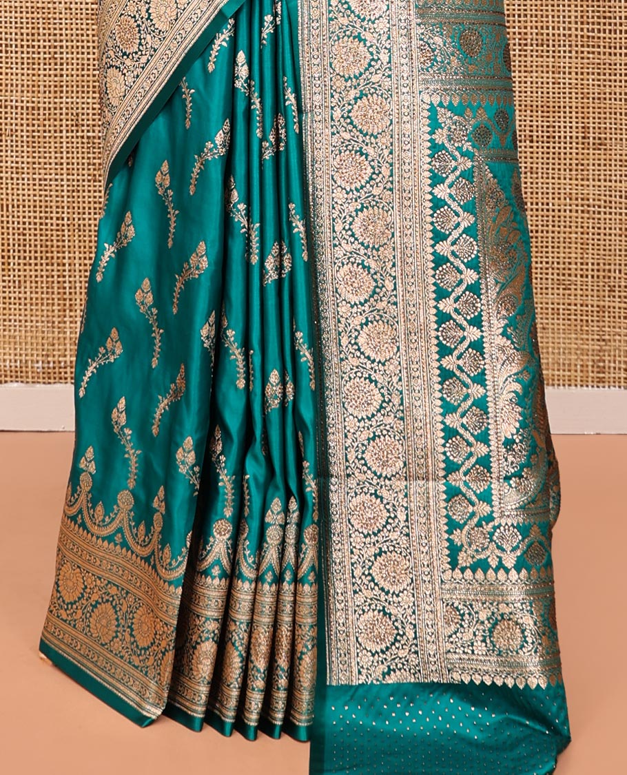 Blue Banarasi Satin Saree, Detailed with Floral Buttas, a Floral Creeper Border, Intricate Stonework Pallu, and a Matching Blouse