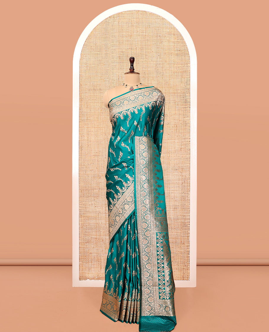 Blue Banarasi Satin Saree, Detailed with Floral Buttas, a Floral Creeper Border, Intricate Stonework Pallu, and a Matching Blouse