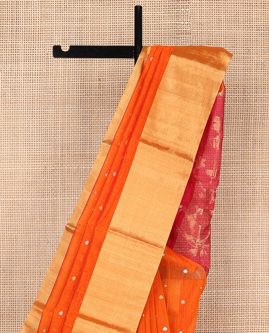 Orange buttas silk saree, bavanji border, and contrast floral zari woven pallu