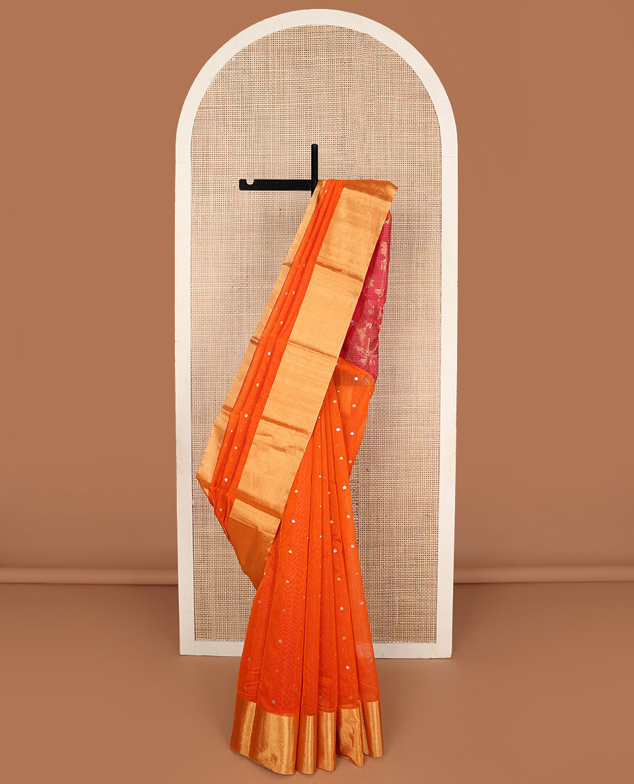 Orange buttas silk saree, bavanji border, and contrast floral zari woven pallu