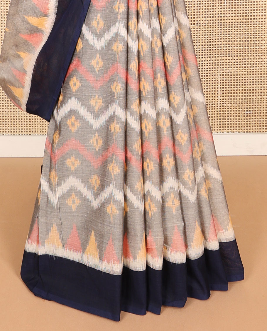 Light grey geometric motifs ikkat cotton saree with contrast border & triangle design pallu