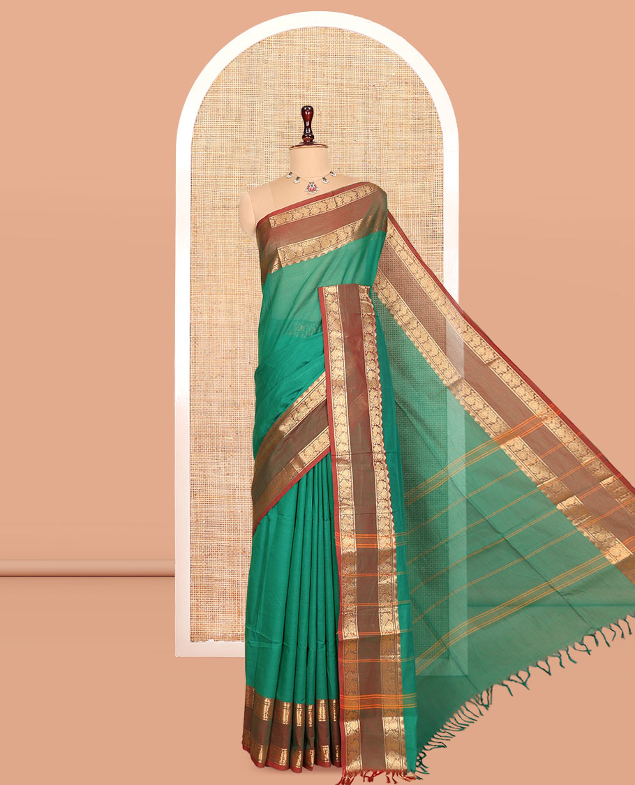 Green Plain Chettinad Cotton Saree, Complemented by a Contrast Rettai Pettu Peacock Zari Border, Striped Pallu, and a Matching Blouse