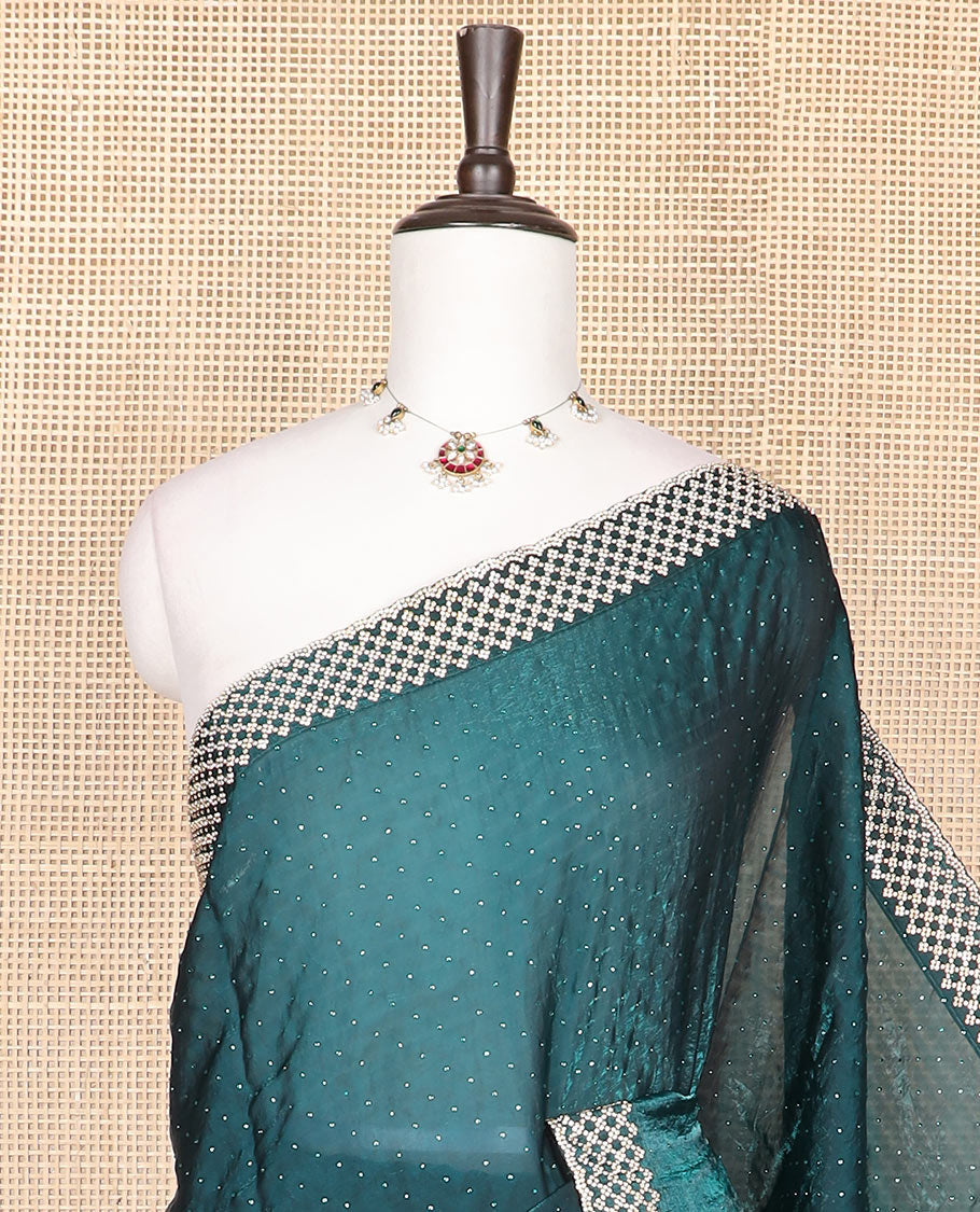 Blue Swarovski stone embroidered designer saree with stones embedded in its body, scallop stone work border