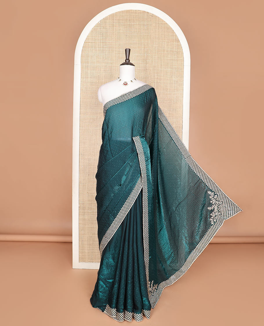 Blue Swarovski stone embroidered designer saree with stones embedded in its body, scallop stone work border