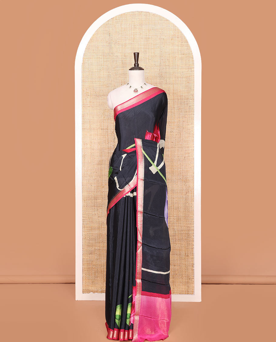 Black Georgette Saree Highlighted with Unique Print, Complemented by a Contrast Traditional Zari Border, Pallu Gleamed Up with Zari, and Paired with a Contrast Buttas Woven Blouse