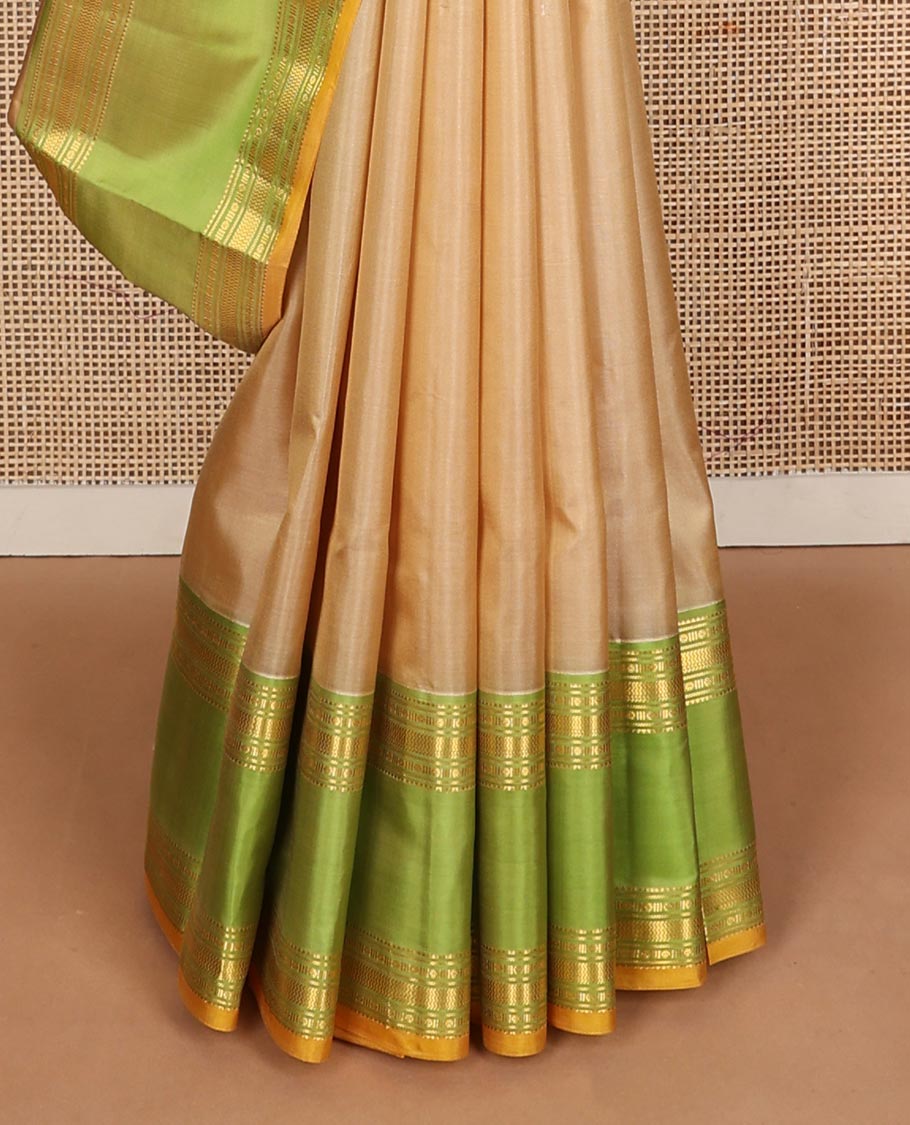Sandal plain Kanchipuram silk saree, contrast rettai pettu border of rekku, rudraksham, banaras, and vanki designs, and zari design pallu