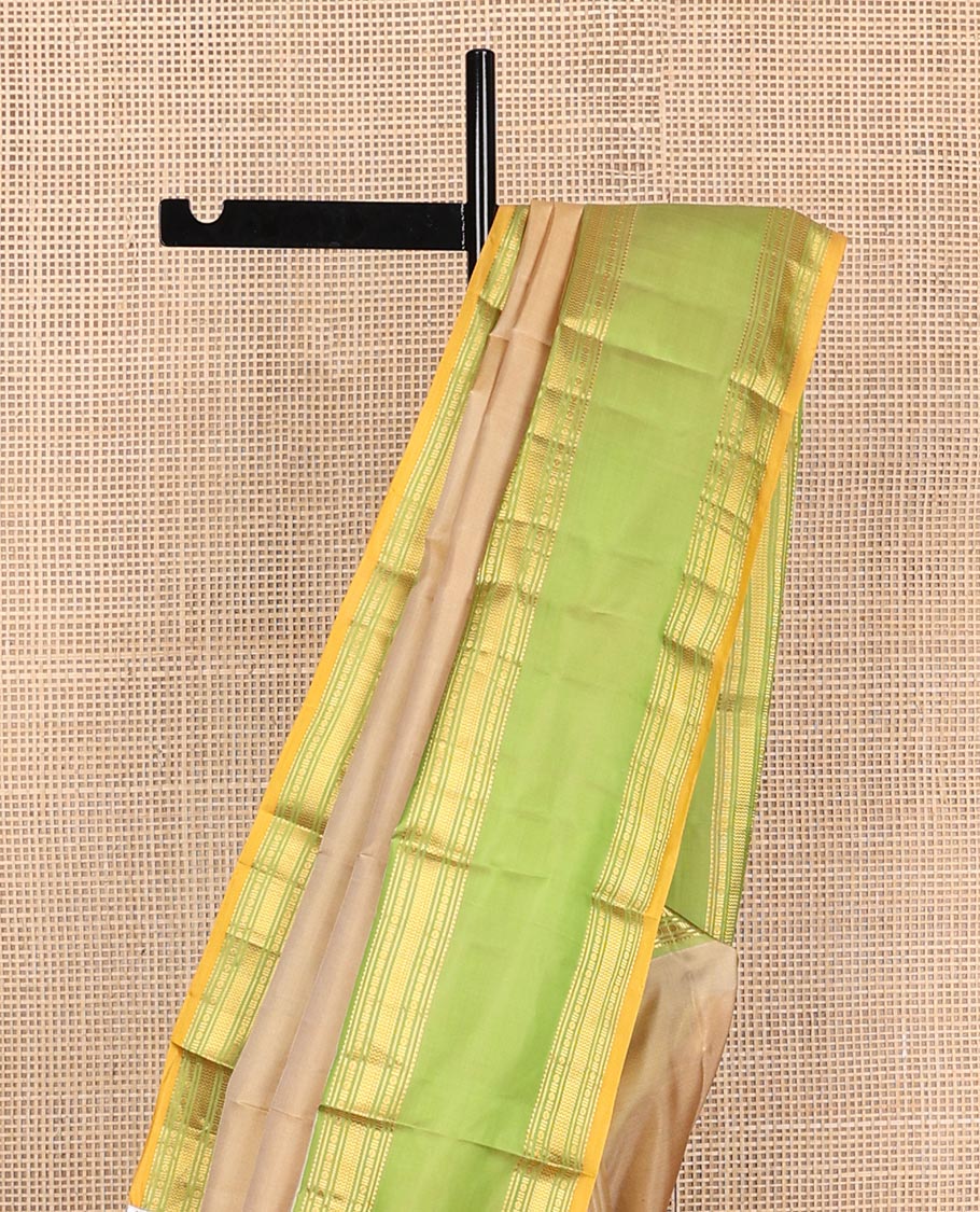 Sandal plain Kanchipuram silk saree, contrast rettai pettu border of rekku, rudraksham, banaras, and vanki designs, and zari design pallu