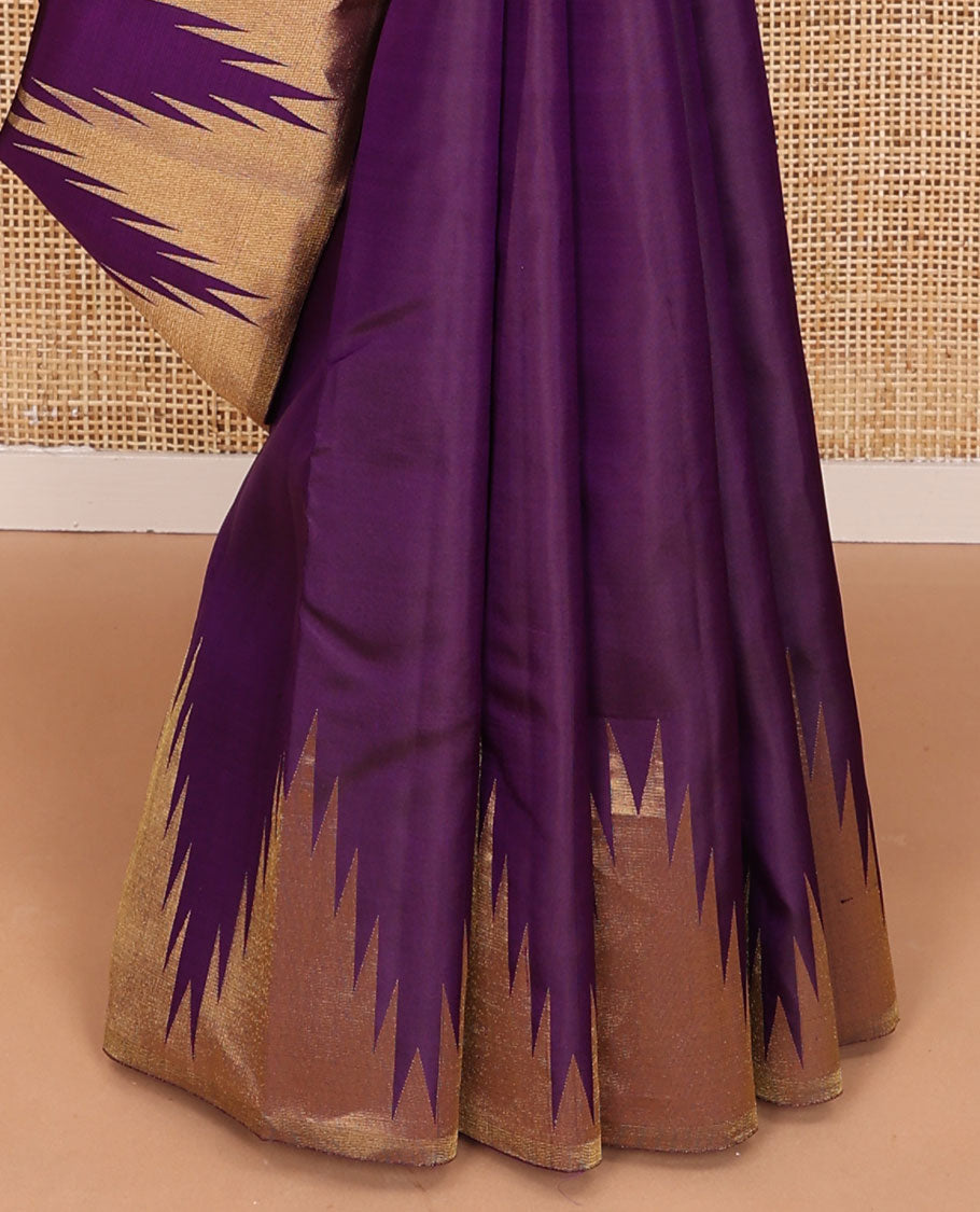 Purple zari buttas Kanchipuram silk saree, thazampoo rekku zari border, and pallu of manga, kolam, and rudraksham motifs enclosed checks