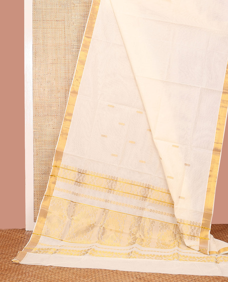 Cream Kerala Saree, Embellished with Zari Buttas on its Body, Subtly Sparkled Bavanji Border, Gleaming Zari Woven Pallu of Floral Designs, and Paired with a Matching Blouse