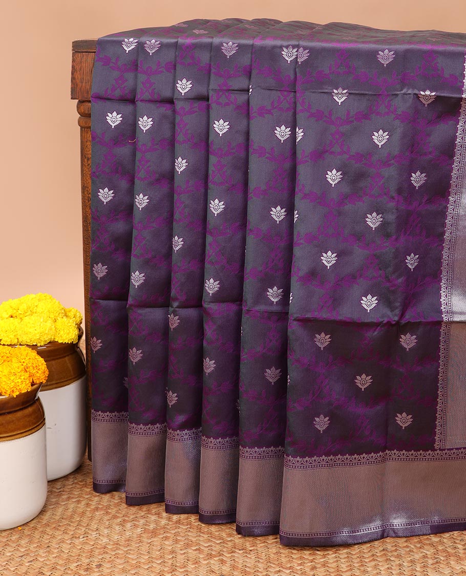 Wine jaal design litchi soft silk saree with silver weaving border & silver zari rich pallu along with butta design blouse