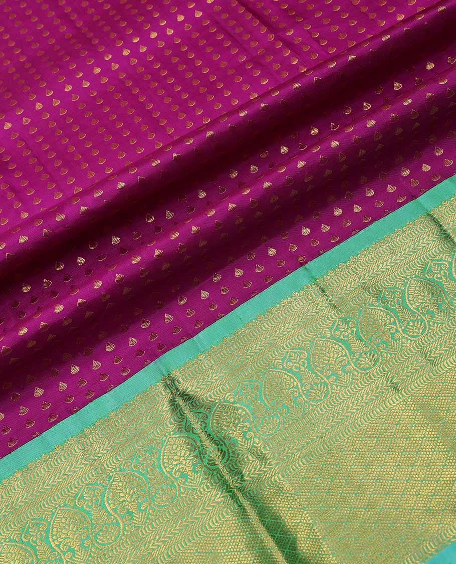 Purple pure silk half-saree, zari buttas skirt, contrast traditional zari motifs steeped border, zari bordered blouse, and contrast leaf jaal dhavani