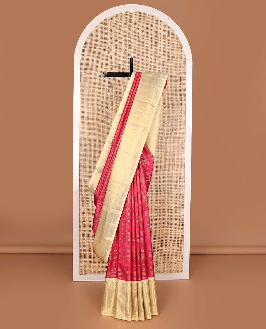 Red muthu striped silks saree, contrast border of manga mokku, muthu, poun, and mayli kann designs, and zari design pallu