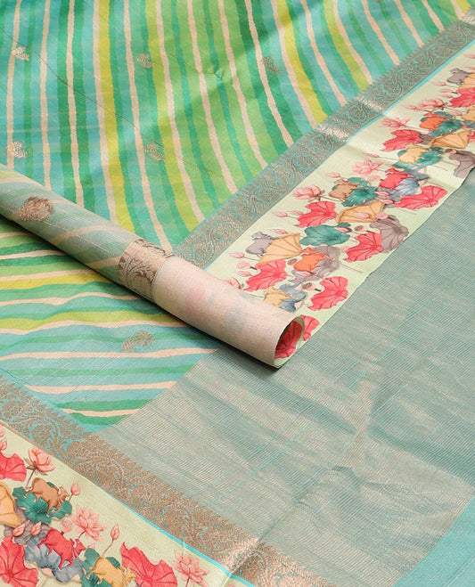 Blue lehariya-style stripes printed tussar saree with zari buttas, contrast traditional zari border of pichwai multi-color floral & cow motifs print & zari striped pallu