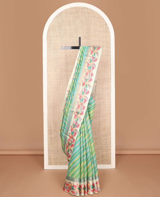 Blue lehariya-style stripes printed tussar saree with zari buttas, contrast traditional zari border of pichwai multi-color floral & cow motifs print & zari striped pallu