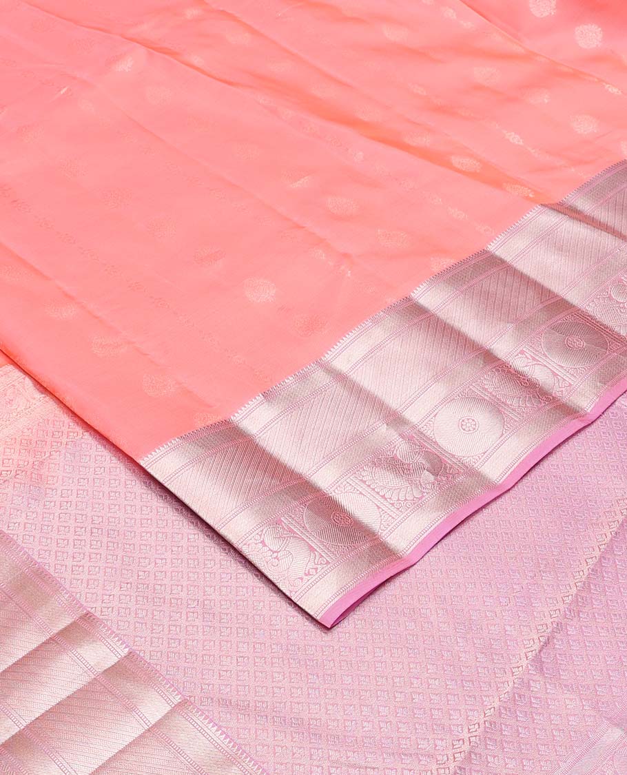 Peach zari buttas Vasundhara silk mix saree, contrast border of rekku, banaras, muthu, and mayil chakram design, and jaal pallu