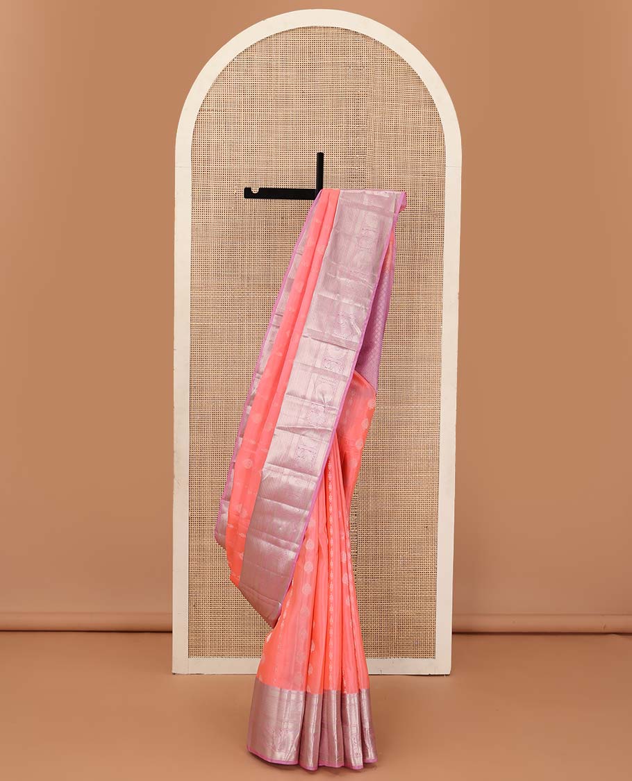 Peach zari buttas Vasundhara silk mix saree, contrast border of rekku, banaras, muthu, and mayil chakram design, and jaal pallu