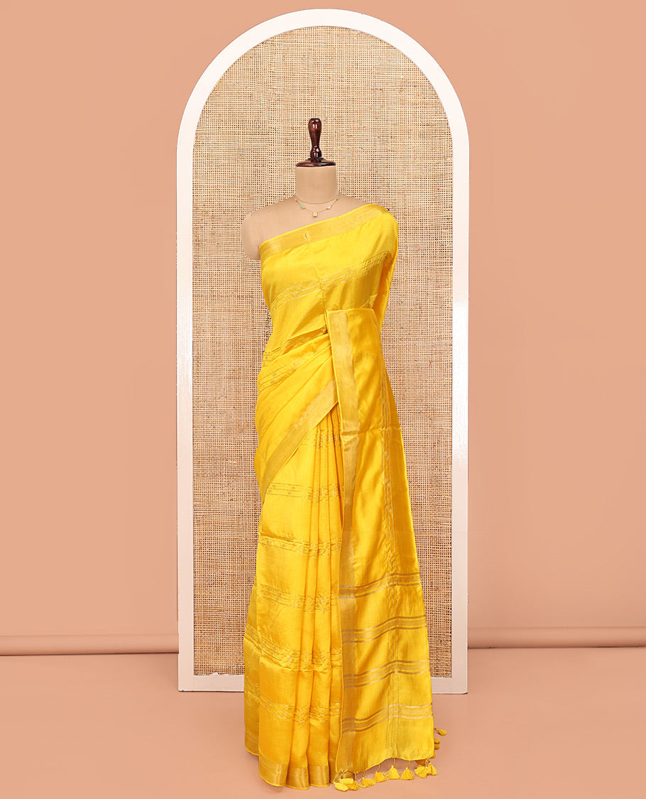 Yellow Banana Pith Saree, Sparsely Woven with Buttas and Stripes on Its Body, Subtly Zari Border, Pallu Steeped with Zari Stripes, and Paired with a Matching Blouse