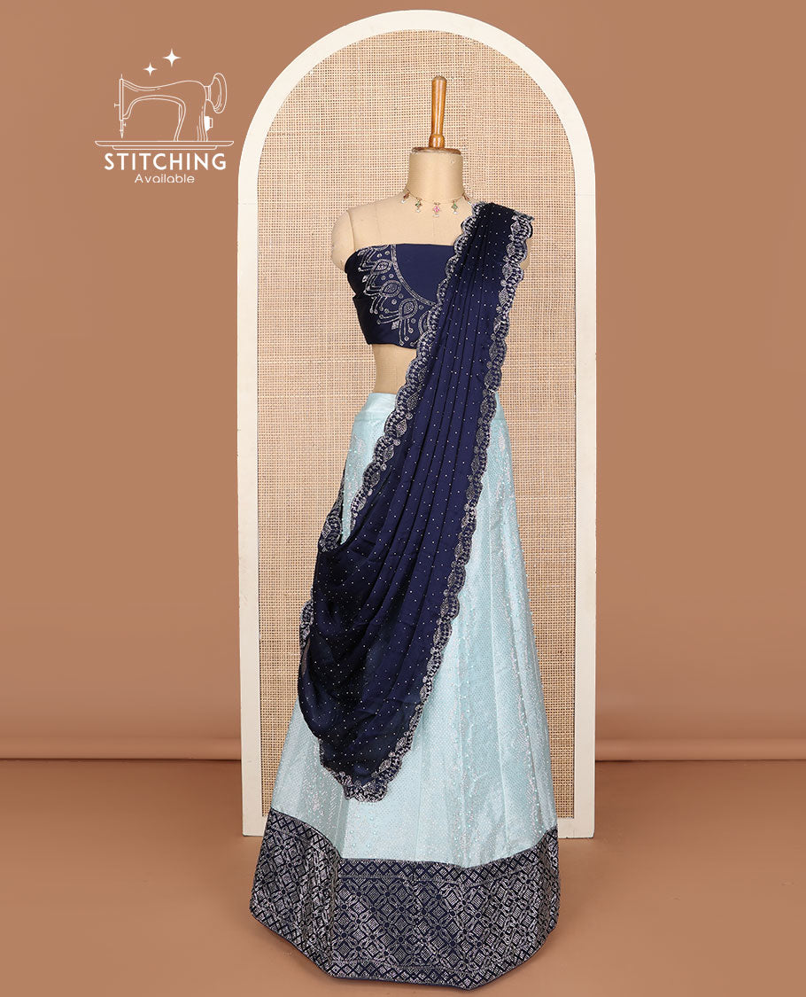 Baby blue lehenga set, gleaming jacquard with contrast geometric patterned border skirt, micro stone embroidered contrast blouse & stone work scallop dhavani