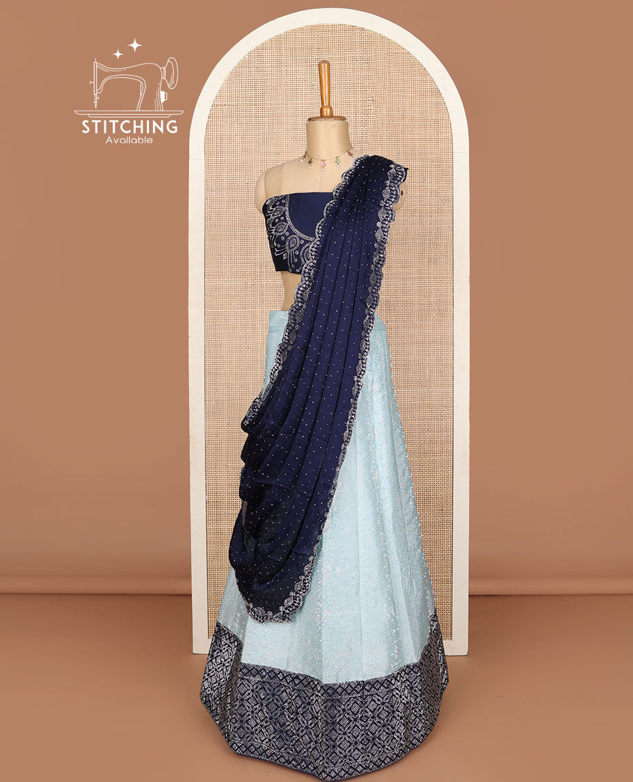 Baby blue lehenga set, gleaming jacquard with contrast geometric patterned border skirt, micro stone embroidered contrast blouse & stone work scallop dhavani