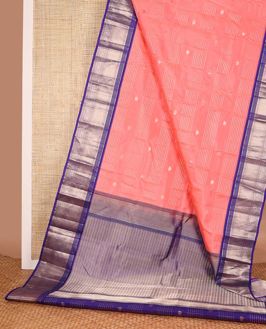 Orange zari design silk saree, contrast border of rekku, Muthu, kathir, rudraksham, and yaanai motifs, and geometric patterned pallu
