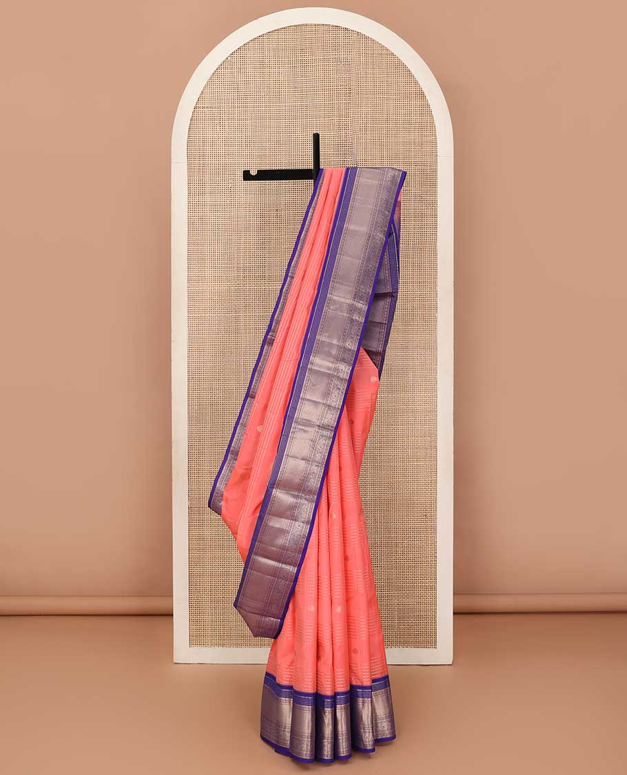 Orange zari design silk saree, contrast border of rekku, Muthu, kathir, rudraksham, and yaanai motifs, and geometric patterned pallu
