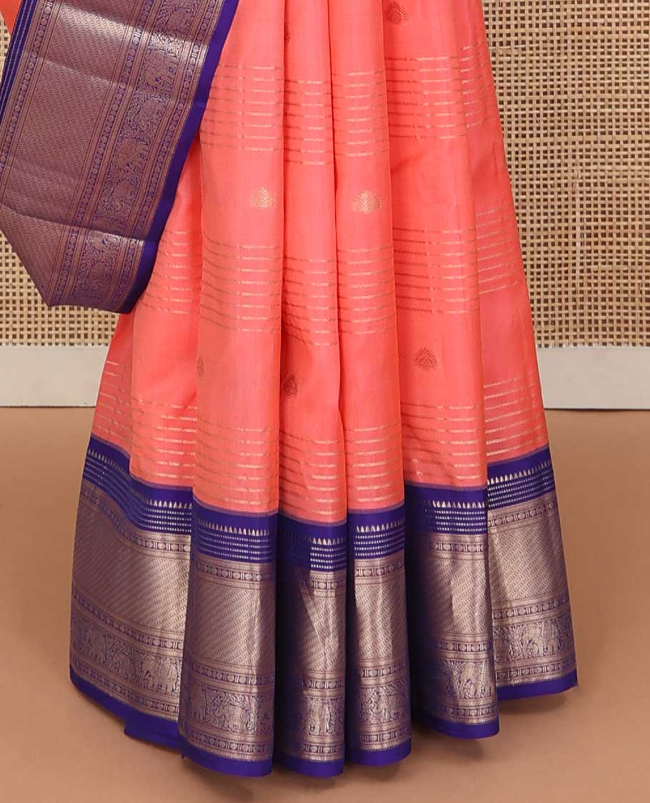 Orange zari design silk saree, contrast border of rekku, Muthu, kathir, rudraksham, and yaanai motifs, and geometric patterned pallu