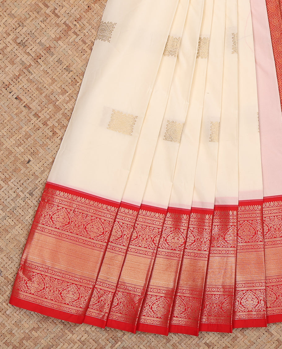 White Budget Silk Saree, Highlighted by Zari Buttas, Complemented by a Contrast Traditional Zari Border, Grand Jaal Pallu, and Contrast Blouse