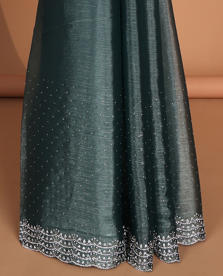 Blue all-over stone work burburry chiffion saree with self cutthana stone work border