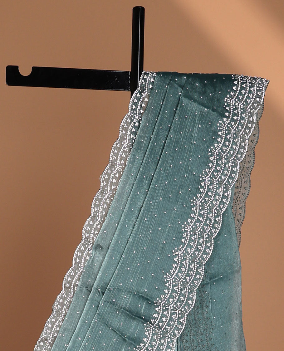 Blue all-over stone work burburry chiffion saree with self cutthana stone work border
