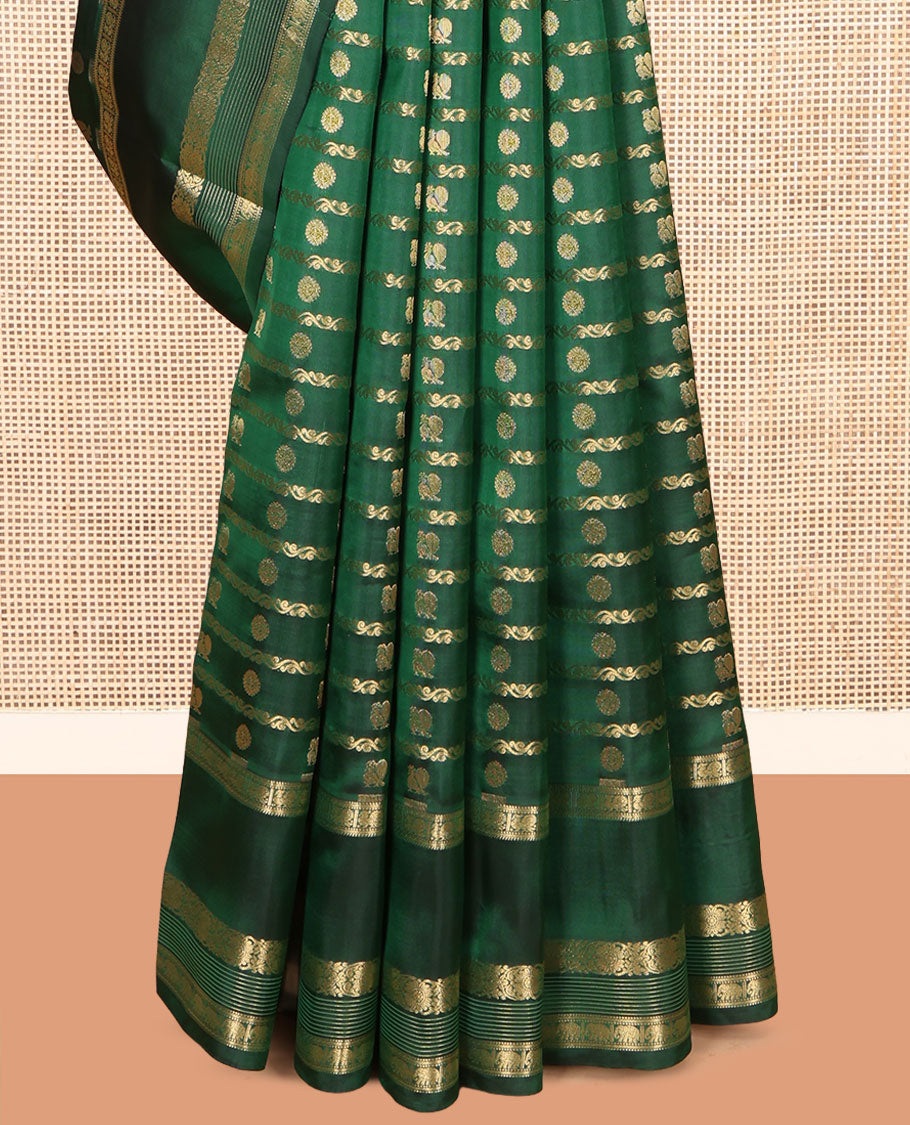 Green Vasundhara Lite Silk Mix Saree, Mesmerized with Zari Buttas and Stripes, a Zari Rettai Pettu Border of Rekku, Muthu, Mayil, Kodi Visiry, and Yaanai, Grand Pallu, and a Contrast Blouse