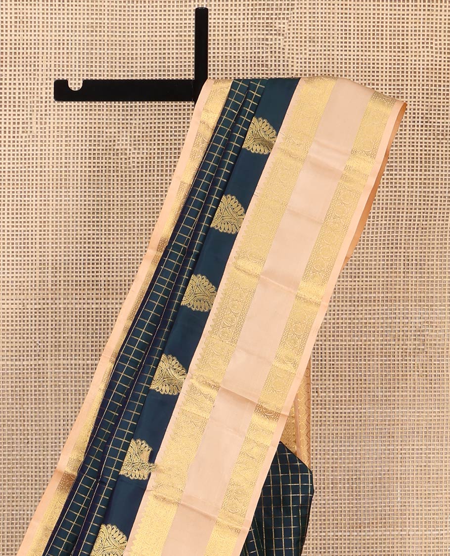Blue Vasundhara Silk Saree, Impeccably Styled with Muthu Checks and Manga Buttas All Over Its Body, Complemented by a Contrast Rettai Pettu Border of Rekku, and Kodi Visiry Designs, Grand Pallu, and Paired with a Contrast Blouse