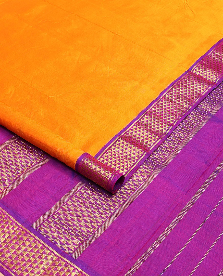 Mango yellow dual-toned plain nine-yard silk saree, contrast ara maadam design korvai border, and pallu of ara maadam designs
