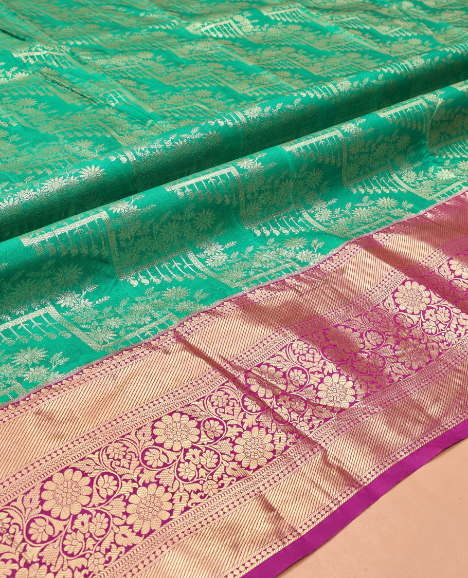 Green Art Silk Material Half Saree, Elegantly Framed with Jacquard Skirt, a Contrast Traditional Zari Border, Contrast Blouse, and an Intricate Dhavani