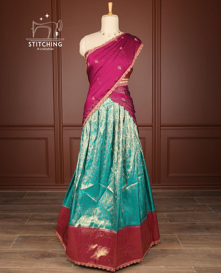 Blue floral jacquard half saree with contrast zari design border, zari design blouse & floral embroidery dhavani