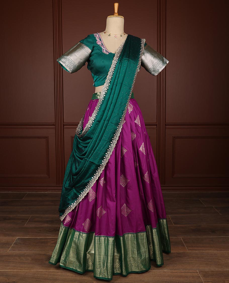 Purple geometric design half saree witn contrast zari design border, floral embroidery blouse & floral embroidery dhavani