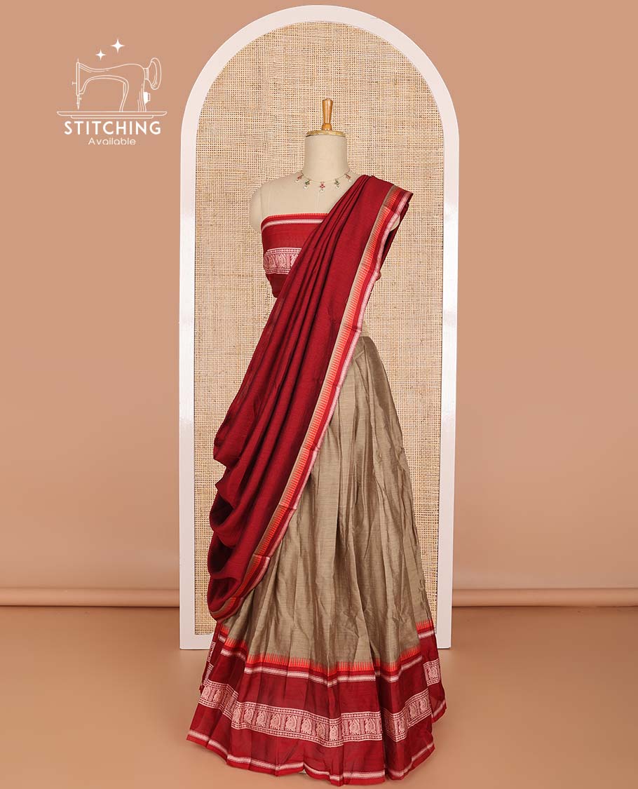 Light brown cotton half saree with contrast peacock design border, peacock design blouse & temple border dhavani