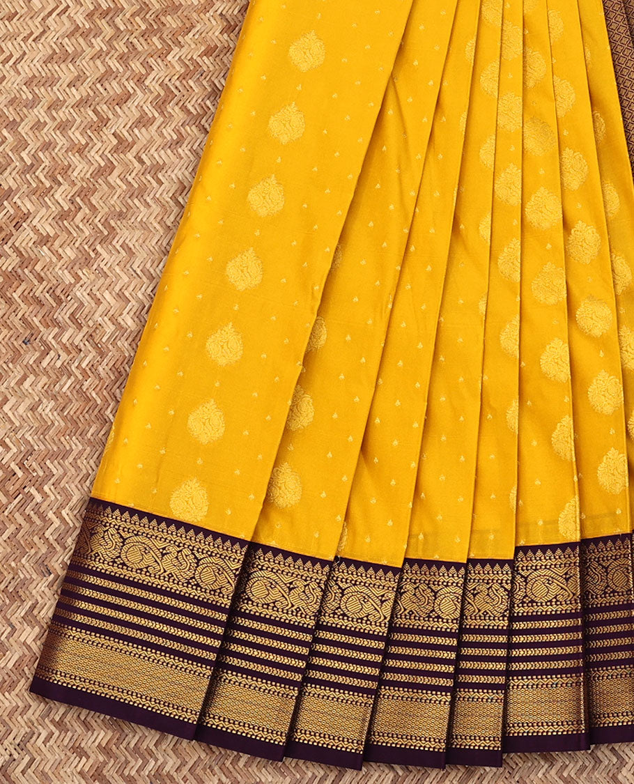 Yellow Budget Silk Saree, Sparsely Woven with Buttas All Over Its Body, Complemented by a Contrast Traditional Zari Design Border, Grand Jaal Pallu, and Paired with a Contrast Blouse