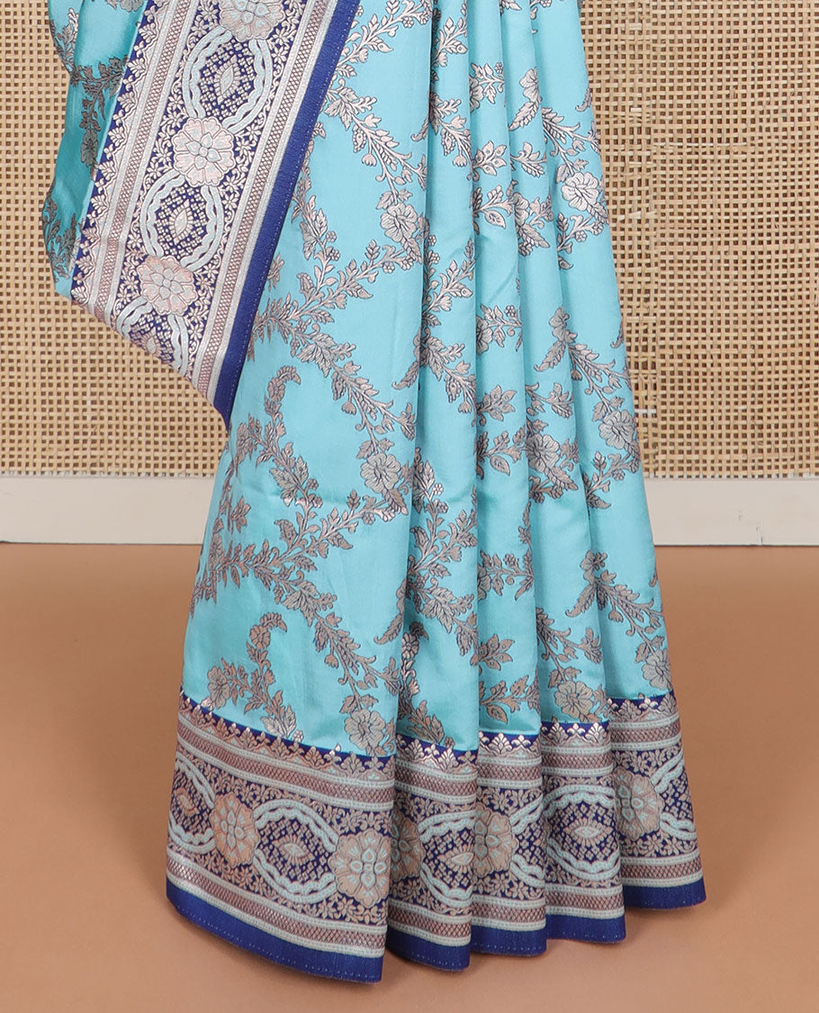 Cyan floral jaal design butter silk saree with contrast intricate zari design border & floral design pallu