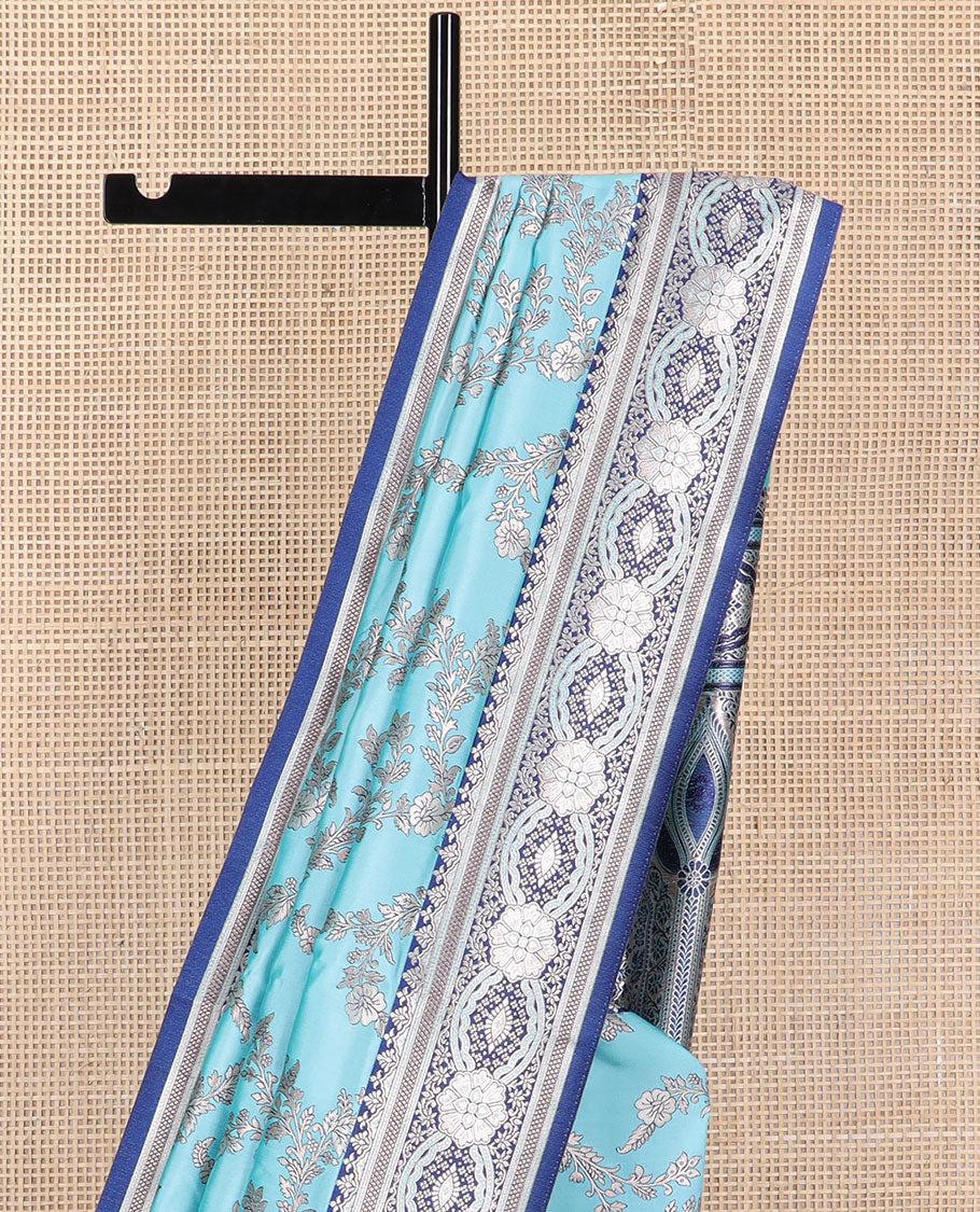 Cyan floral jaal design butter silk saree with contrast intricate zari design border & floral design pallu