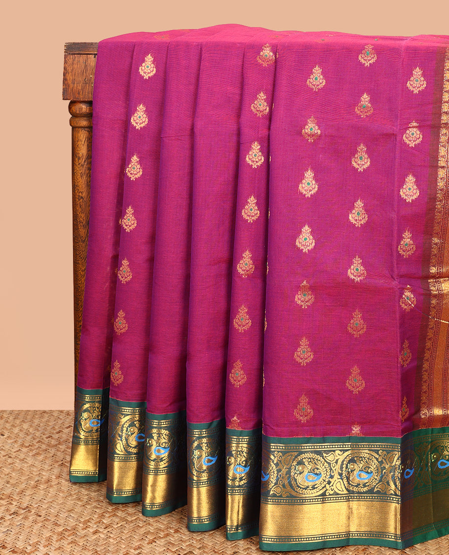 Magenta Venkatagiri Cotton Saree, Embellished with Meena Buttas on Its Body, Complemented by a Contrast Traditional Zari Border of Peacock Designs, Gleaming Scallop-Design Pallu, and Comes Without a Blouse