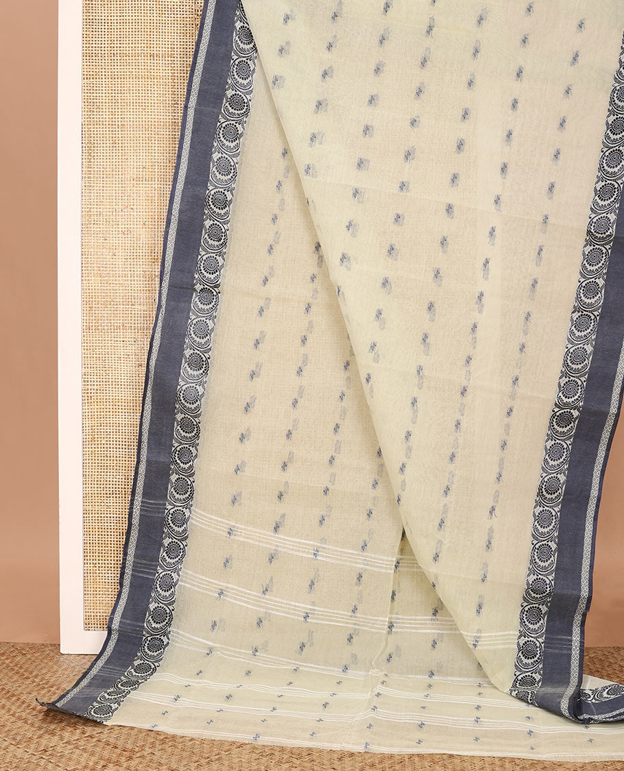 Beige buttas Bengal cotton saree, contrast floral creeper border, and pallu of stripes, and buttas