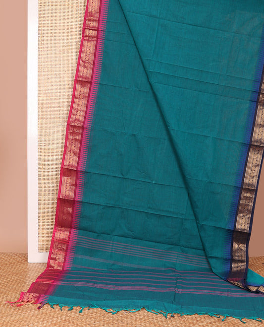 Blue plain Chettinad cotton saree, contrast ganga jamuna traditional zari design border, and pallu of stripes