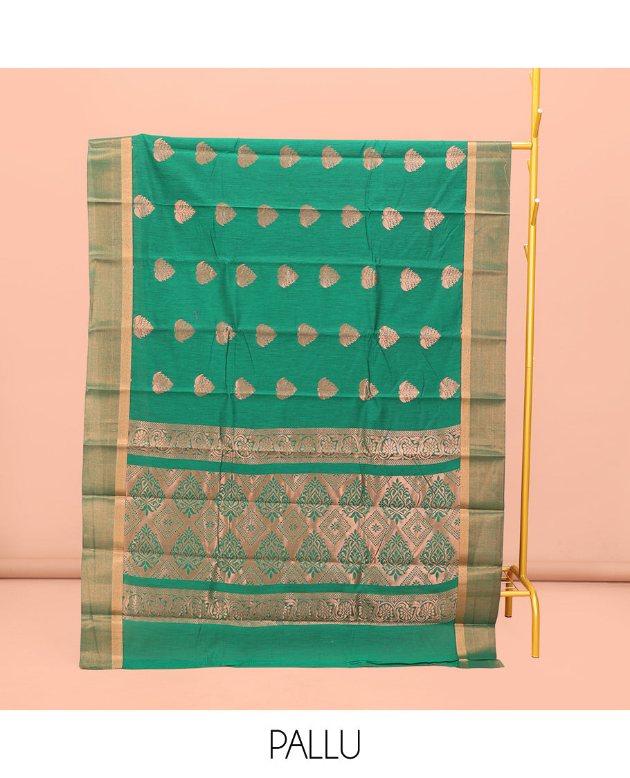 Green Semi-Silk Cotton Saree, Highlighted by Zari Buttas All Over Its Body, Highlighted by a Zari Border, Pallu of Intricate Zari Design, and Paired with a Matching Blouse