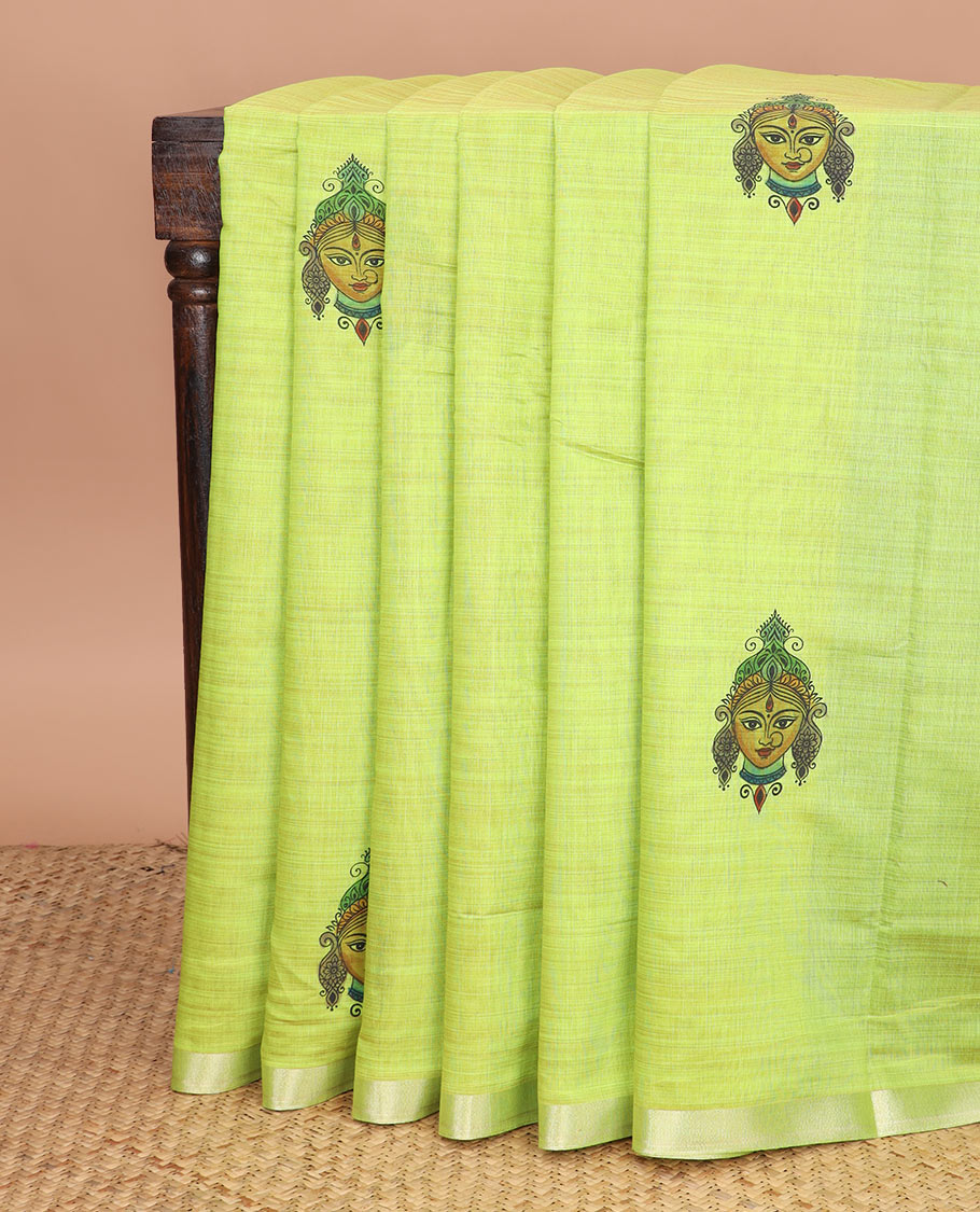Leaf green kalamkari buttas printed chirala cotton saree, bavanji border, and contrast musical motifs print pallu