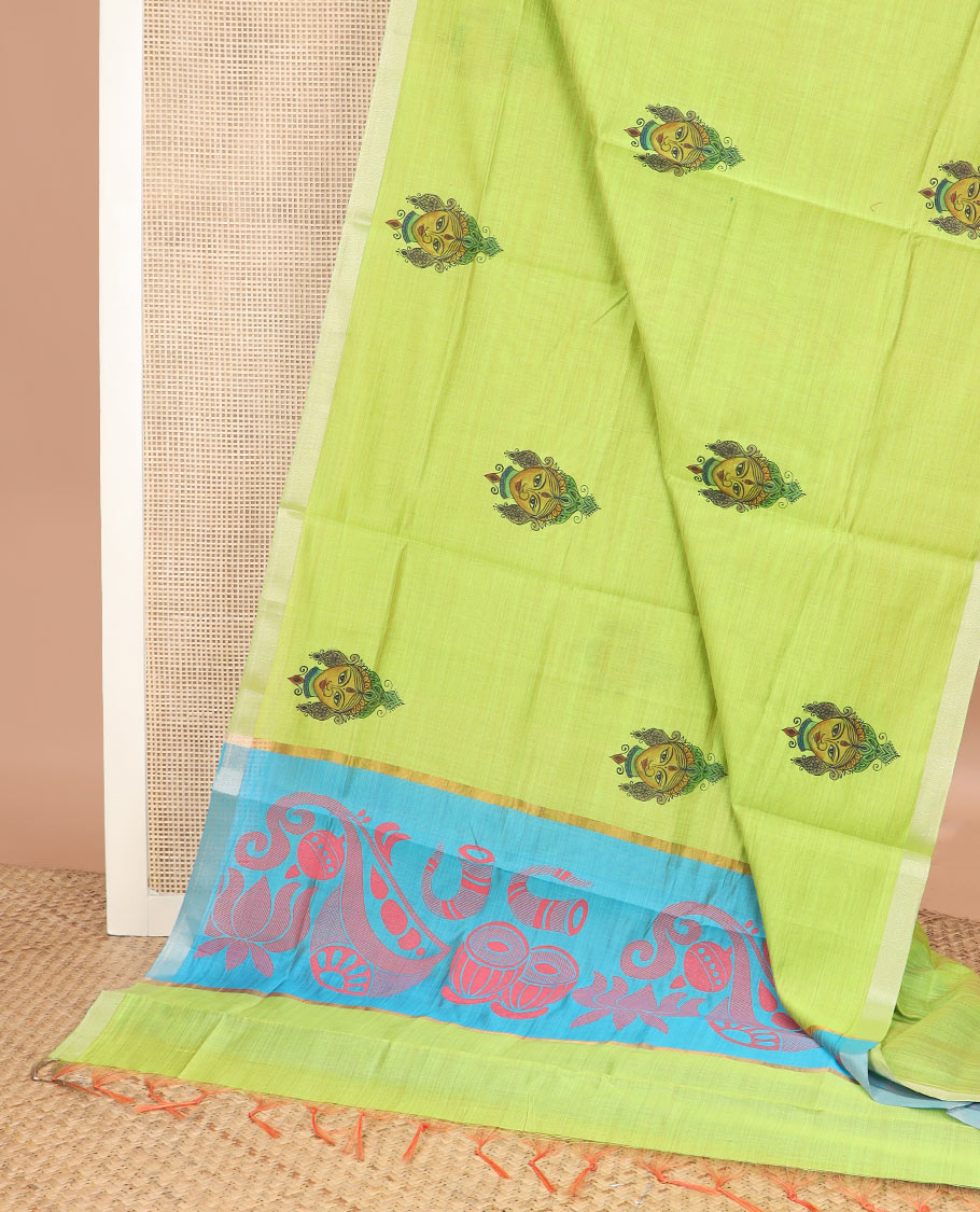 Leaf green kalamkari buttas printed chirala cotton saree, bavanji border, and contrast musical motifs print pallu