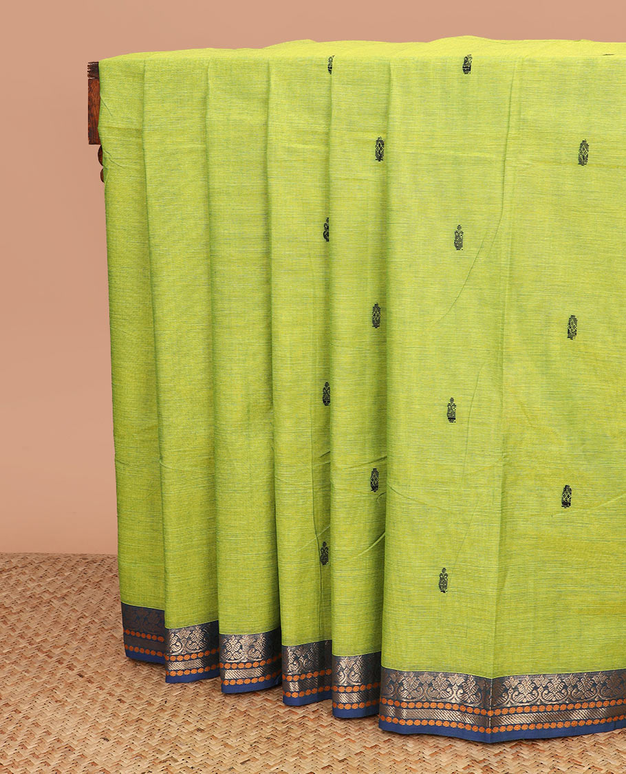 Leaf green buttas Chettinad cotton saree, contrast traditional design border, and striped pallu